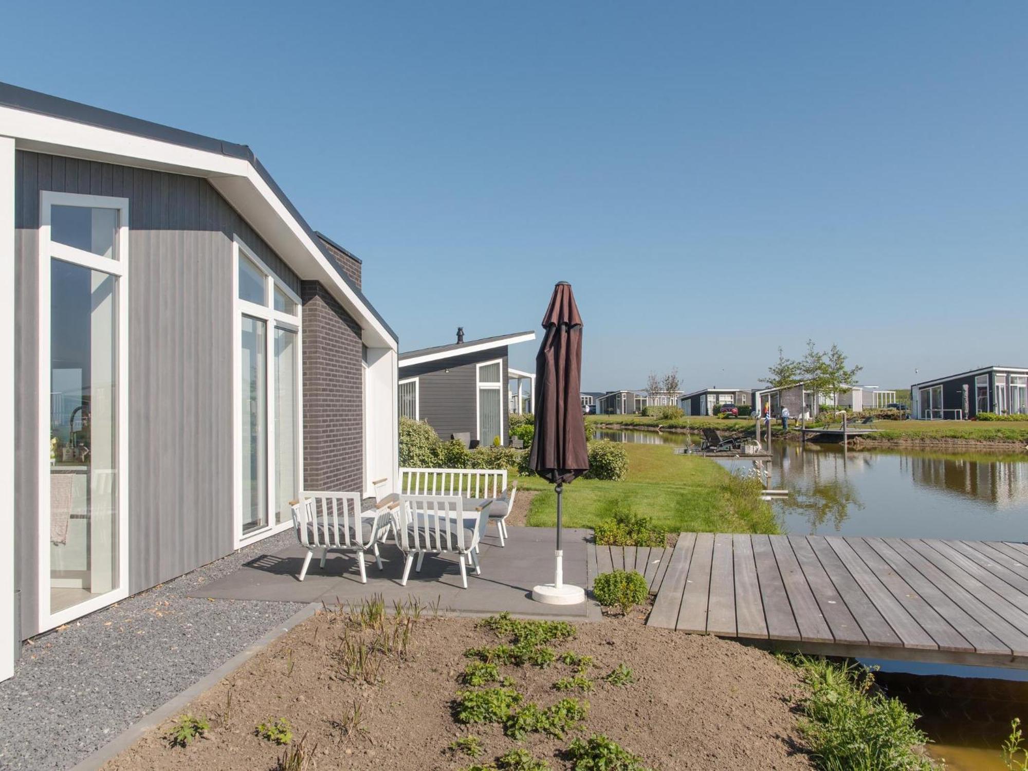 Vakantiehuis Vakantiehuis Waterresort Oosterschelde - Huisnr. 28 Wemeldinge